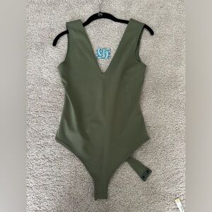 Free People V-neck body suite new with tags size M